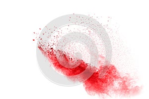 Red powder explosion isolated on white background.