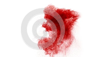 Red powder explosion isolated on white background