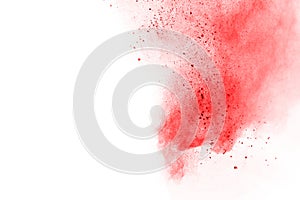 Red powder explosion on white background. Colored cloud. Colorful dust explode.