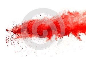 Red powder explosion on white background. Paint Holi.