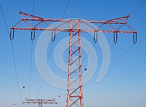 Red power pole on blue background