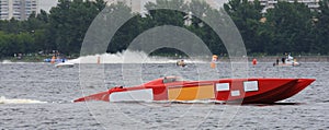 Red powerboat from f1 on water