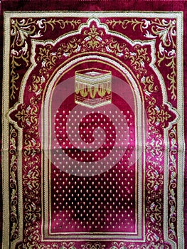 The red prayer rug is a device made of cloth that usually has an image and style that breathes Islam. Prayers are used by Muslims