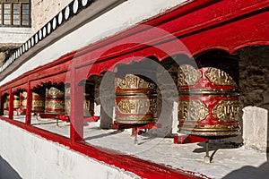 Red Prayer Wheels in Buddhist Tibetan of Shey Palace Leh Ladakh