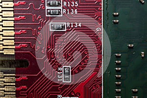 red printed circuit Board with components, chip and contacts
