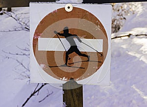 A red prohibited direction sign to preserve cross country ski tr