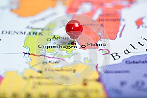 Red push pin on map of Denmark