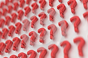 Red question marks on a background of white signs. 3D Rendering image