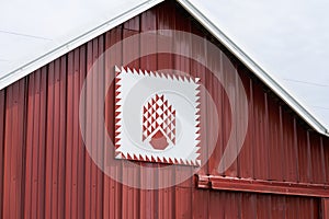 Red Quilt Pattern on Red Barn