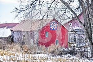 Red Qult Barn with Welcome Wheel pattern