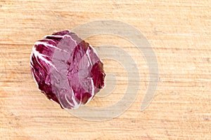 Red radicchio on a bamboo board