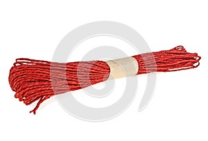 Red raffia rope on white background