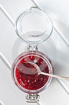 Red rasberries jam in jar