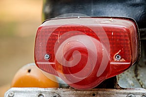 Red rear light of vintage Japanese motorcycle