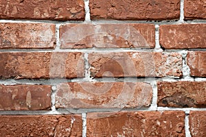 Red and red brick wall close. Template for designers