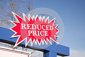 Red Reduced Price Burst Sign