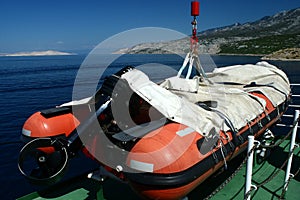 Red rescue boat on Croatian ferry