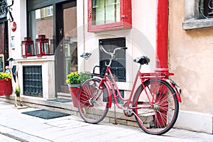 Red retro bicycle. Outdoors.