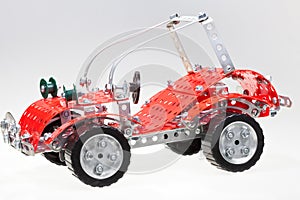 Red retro car from metal construction set