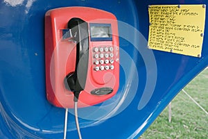 Red retro phone in the booth