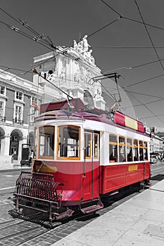 Red retro tram Commerce Square in Lisbon
