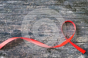 Red ribbon awareness for World aids day concept