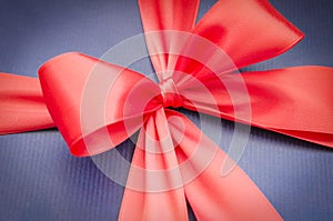 Red ribbon on blue background