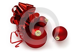 Red ribbon bow and christmas balls isolated on white background
