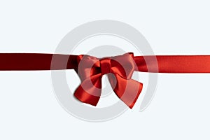 Red ribbon bow isolated on white