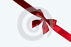 Red ribbon bow isolated on white