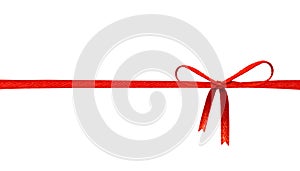 Red ribbon bow isolated on white background. Celebration label for your design.  Clipping paths object