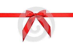 Red ribbon with bow on white background