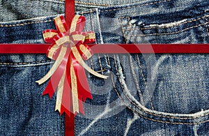 Red Ribbon on detailed scan of jeans for background photo