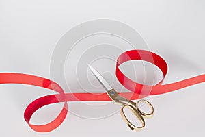 Red ribbon golden scissors cutting with Text space 3D rendering