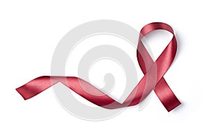 Red ribbon isolated on white background Photo object for sign world aids day