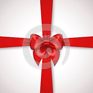 Red Ribbon with Satin Bow Tied Around Gift Box