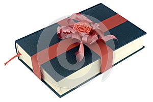 Red ribbon tied black book