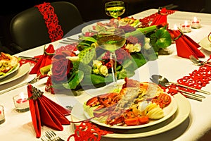 Red ribbons on festive table