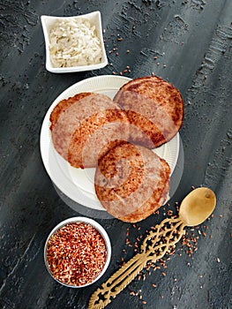 Red rice pancakes, Fermented and steamed Indian rice pancakes, challapongaram, pongaram, south indian recipes, appam, vellappam,