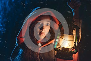 Red riding hood with an oil lamp