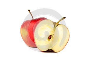 Red ripe apple with fresh sliced apple piece isolated on white