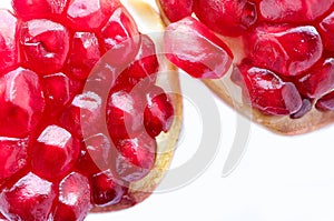 Red ripe pomegranate fruits and opend pomegranate on white background