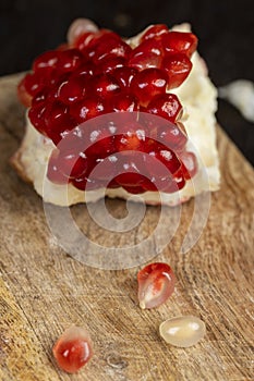 red ripe pomegranate with red grains