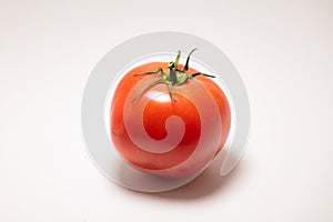 red ripe tomato isolated