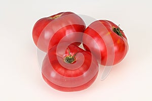 Red ripe tomato isolated on white