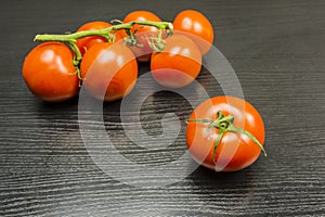 Red ripe tomato on the table.