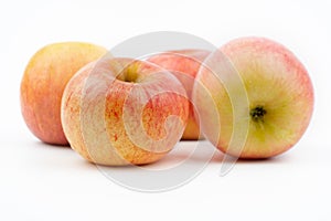 Red ripening apples isolated on a white background