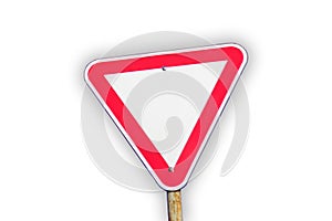 Red road sign isolated. Defocus blank empty triangle red warning road sign on white background. Danger direction. Shadow