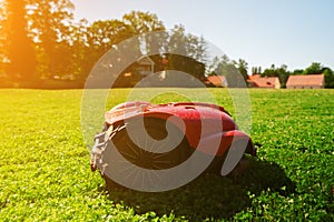 Red robotic lawn mower