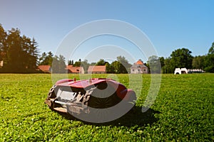 Red robotic lawn mower